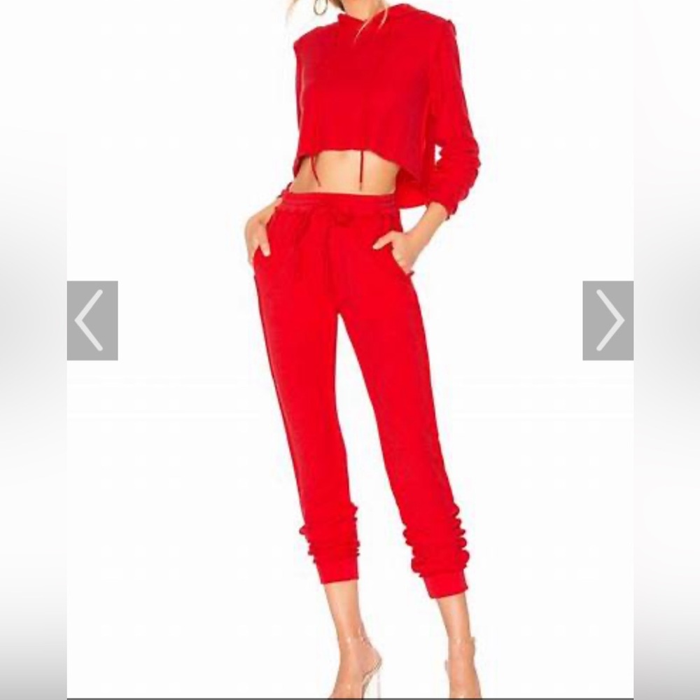 Crop top and ankle pants. Form fitting.
DANIELLE GUIZIO, Cherry Red sweatsuit